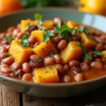 Delicious Squash and Kidney Beans dish with vibrant vegetables and spices.